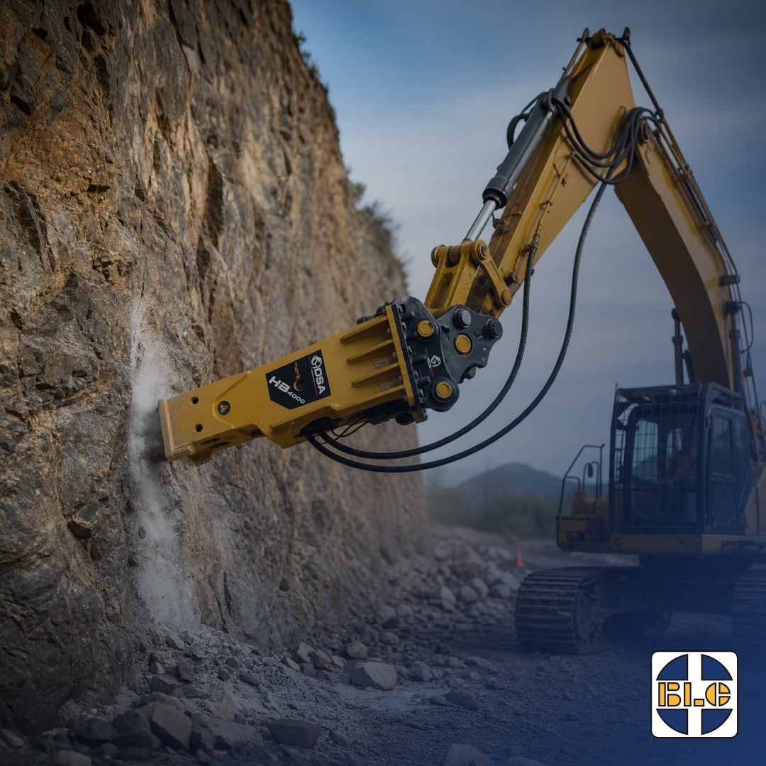 Excavator hydraulic hammer breaking a rock face